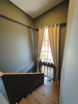 an empty room with a window and a wooden floor at Bangkok Thailand Core Business District 3b3b Duplex Private House Family Room Cooking Smoking Nursery in Bangkok