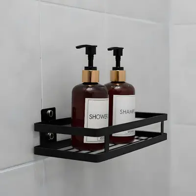 a shelf with two bottles of soap on it at XX GO INN BTS Nana Sukhumvit Soi 3 x โกอินน์ บีทีเอส นานา ซอย 3 in Makkasan