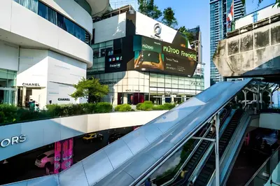 an escalator in the middle of a city at XX GO INN Sukhumvit Soi 20 - โกอิน สุขุมวิท 20 BTS อโศก in Bang Kapi