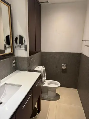 a bathroom with a toilet and a sink at Wish Inn Silom - วิช อินน์ สีลม in Bang Rak