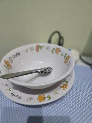 a plate with a fork on top of a table at 209 Beautiful and Cozy apartment near skytrain & WiFi in Bangkok