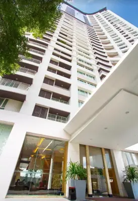a tall white building with potted plants in front of it at 2Br, Good view, BTS Chitlom, BKK in Bangkok