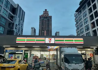 a truck is parked in front of a gas station at Bright & Spacious 1 BR - ASOKE in Bangkok