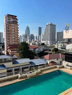 a view of a city skyline with a swimming pool at High Floor Great View 2BR 2BA 3 mins to Nana BTS in Bangkok