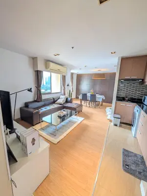 a living room with a couch and a table at High Floor Great View 2BR 2BA 3 mins to Nana BTS in Bangkok