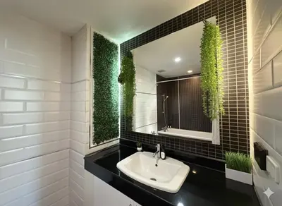 a bathroom with a sink and a mirror at City Center Nana 4-Guest Suite 100m Nana BTS in Bangkok