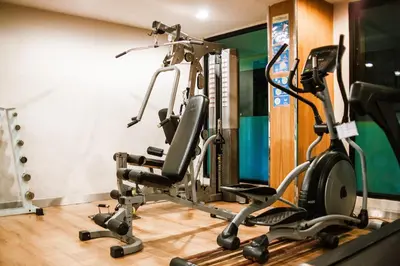 a gym with two exercise bikes in a room at Zenith Place Huge 2BR Low-rise condo in Bangkok