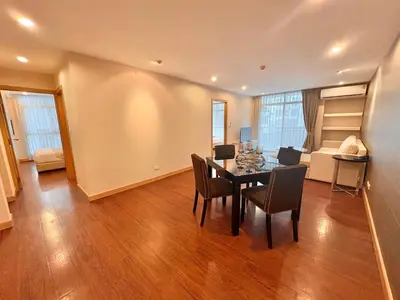 a dining room with a table and chairs at ICON NARINDRA SUITES HOTEL Sukhumvit Bangkok Thailand 50sqm to 90sqm Rooms & FREE Minibar in Bangkok