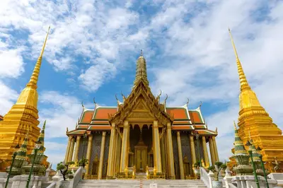 a temple in bangkok with a cloudy sky in the background at XX GO INN Khaosan - โกอินน์ ถนนข้าวสาร in Bangkok