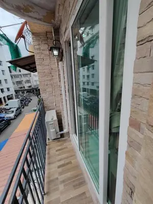 a balcony with a view of a street at Am Am Place D Near Rajamangala in Sathani Khlong Tan