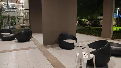 a group of chairs sitting in a lobby at Lumpini park chatuchak in Bangkok