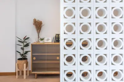 a room with a white door with plates on it at 3789 Elevator Villa in Bangkok