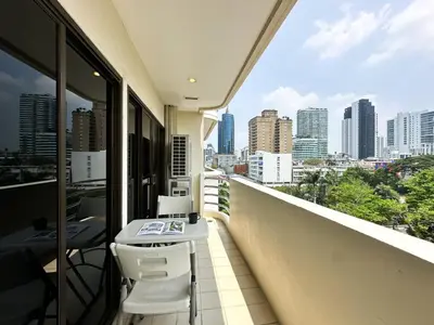 a balcony with a view of a city skyline at Vibrant Modern 57 SQM - Ultra Fast WiFi - BTS Thonglor in Bangkok