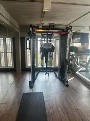 a room with a gym with a camera in it at Stylish Apartment in Sukhumvit in Bangkok
