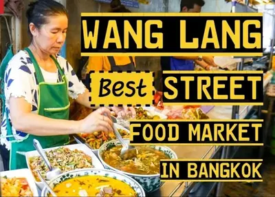 a woman preparing food in a food market at Wanglang Home in Bangkok Noi
