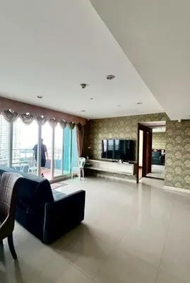 a large living room with a couch and a tv at Room near Iconsiam 2km in Bangkok