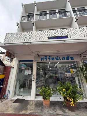 a store front of a building with plants in front at GM6 - Samyan 4floors, 4mins walk to Bantadtong in Bangkok