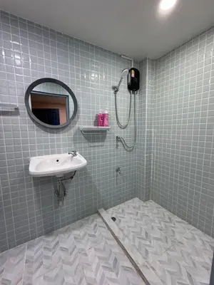 a bathroom with a sink and a shower at GM6 - Samyan 4floors, 4mins walk to Bantadtong in Bangkok
