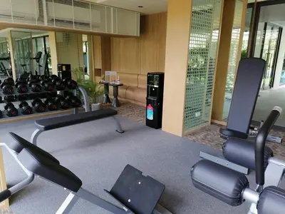 a gym with cardio equipment in a building at Amazing 1 bedroom 2 mins walk BTS On Nut in Bangkok