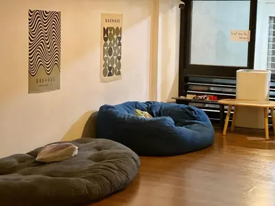 a room with two bean bags on the floor at smoking buddy house in Bangkok