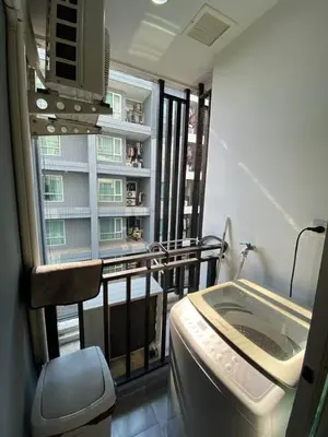 a hospital room with a bed and a window at Stunning Condo - BTS On Nut - Pool, Gym, Wi-Fi in Bangkok