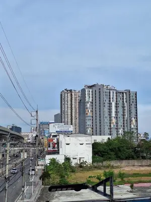 a view of a city with tall buildings at Mari's space city view in Nonthaburi
