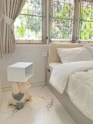 a doll with a box on its head in a bedroom at 5 beds private garden resort 452sqm Pet relax in Sathani Ban Hua Mak