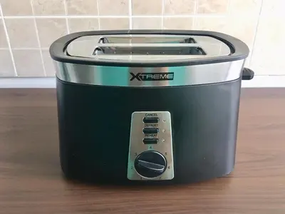 a slow cooker sitting on top of a table at White Turquoise -1 Bedroom Apartment- in Bangkok