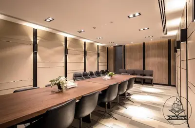 a conference room with a long table and chairs at Luxury Riverside Condo, 3 SKY Pools , Close to MRT Train Station in Ban Sai Ma