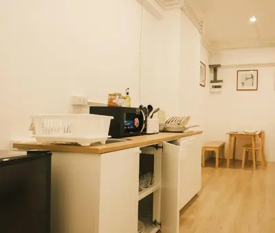 a kitchen with a counter with a microwave on it at City Silom I King Bed I Sleep 3 I 2 Bedroom in Bangkok