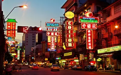 a busy city street with many neon signs at XX The Character China Town - เดอะ คาแรคเตอร์ เยาวราช in Samphanthawong