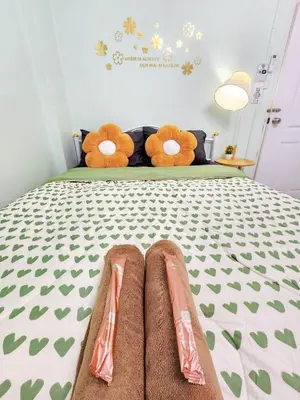 a bedroom with a bed with two teddy bears on it at 804-STP Homely room Free Wi-Fi and Near BTS line in Bangkok