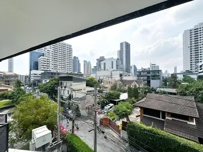 a view of the city from the balcony of a apartment at Tropical Modern 1BR - Ultra Fast Wifi - Thong Lo in Bangkok
