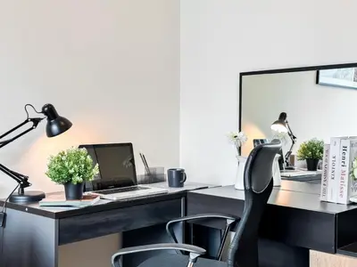an office with a desk with a computer and a chair at Luxury City-Scape 2BR - Ultra Fast Wifi - Asoke in Bangkok