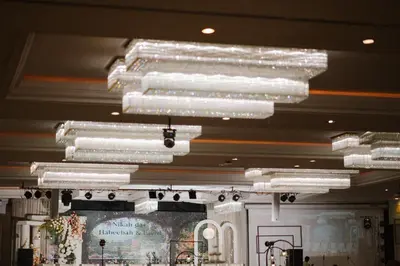 a group of lights hanging from the ceiling at Avana Bangkok Hotel & Convention Centre in Bangna