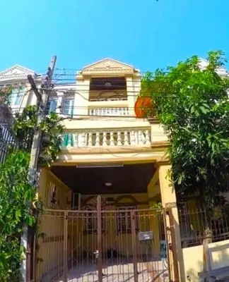 a building with a fence in front of it at TheStarHome Sukhumvit71 in Bangkok