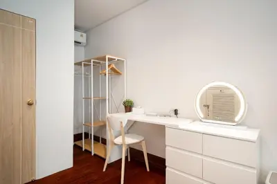 a white bathroom with a sink and a mirror at 2BR 1BA Home In Yaowarat 5 Min MRT Nivas Wanit ECO in Bangkok