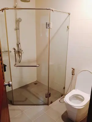 a bathroom with a shower and a toilet at XX Yon INN Sukhumvit 4- BTS Nana in Bangkok