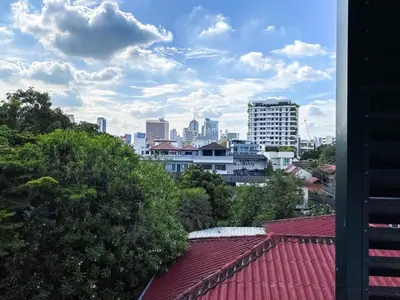a view of a city skyline with tall buildings at Tropical Urban 43 Sqm - Ultra Fast Wifi - Thong Lo in Bangkok