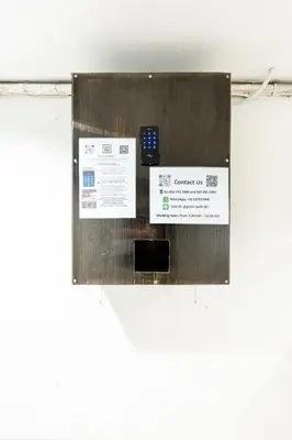 a sign with a cell phone on a wall at XX Oh My Nap BTS Nana - โอ้ มาย แน็ป บีทีเอส นานา in Bangkok