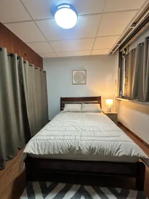 a bedroom with a bed in a room at Mango Hostel - 420 Friendly in Bangkok