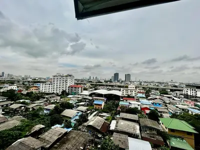 an overhead view of a city with houses and buildings at Comfy1BR at Bangson byBB in Bangkok