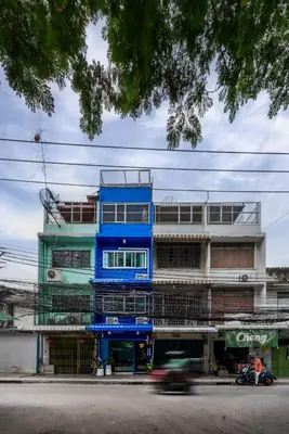 a blue building on the side of a street at Blue House 191 Hometel in Chinatown