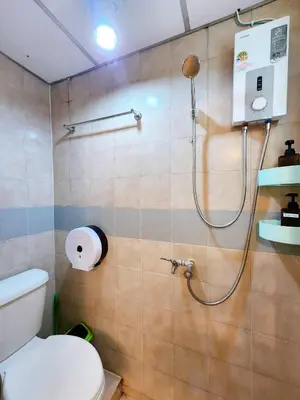 a bathroom with a shower and a toilet at 808-STP Homely room Free Wi-Fi and Near BTS in Sathani Bang Khen