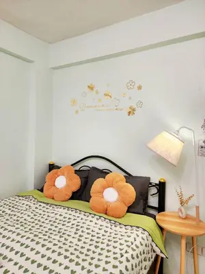 a bedroom with a bed with two stuffed animals on it at 808-STP Homely room Free Wi-Fi and Near BTS in Sathani Bang Khen