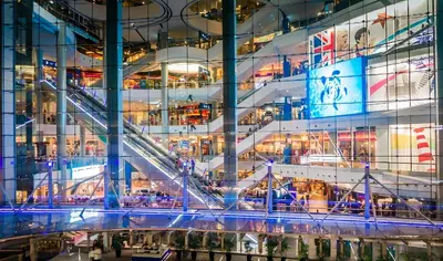 a view of a building with a spiral staircase at I LOVE BANGKOK - Thai Style Room near Skytrain Asok, T21, and EM District Malls in Bangkok