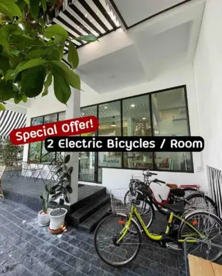 a bicycle parked in front of a building at Homemade Ice cream house in local village in Bangkok