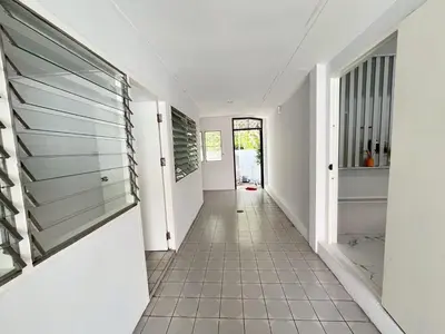 a hallway with white walls and a tile floor at Near Airport 2nd room for 2,8K & 3rd for 1,8K & 4th only 300B INBOX! in Sathani Ban Hua Mak