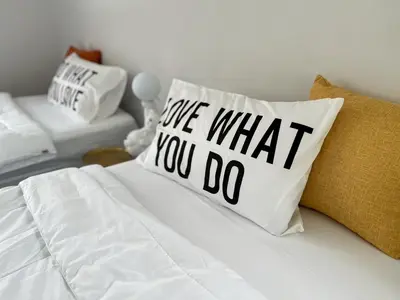 a pillow that says give what you do on a bed at Near Airport 2nd room for 2,8K & 3rd for 1,8K & 4th only 300B INBOX! in Sathani Ban Hua Mak