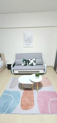 a living room with a couch and a coffee table at New room DMKairport,BTS, impact 340 in Ban Song Hong